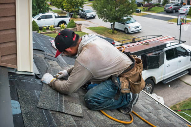 Professional Roofing technician working in Surry, ME